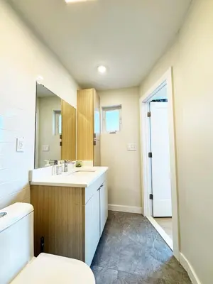a bathroom with a toilet and a sink at The Executive - Center-City - 3BR-4Bath-Private-Garage in Philadelphia