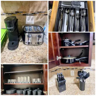 a kitchen cabinet with utensils and a pot and pans at Cozy 2BR Brick Haven! Near light rail! 35m to NYC in Jersey City