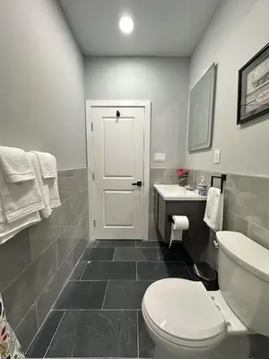 a bathroom with a white toilet and a sink at New Spacious 2 bedroom in Central Philly in Philadelphia
