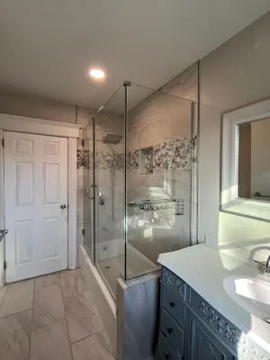 a bathroom with a shower and a sink at Grand Bergen Home Near NYC-Shops in Maywood