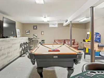 a office with a pool table in a room at Memorabile Getaway Fire-Pit and Entrainment Area in Long Pond