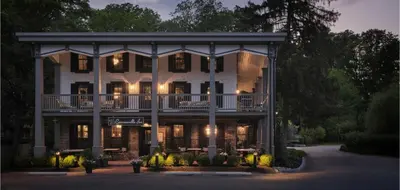 an exterior view of a building at night at Carversville Inn in New Hope