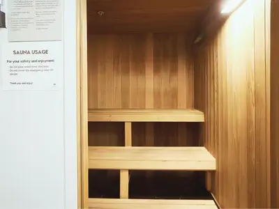 a wooden cabinet with wooden shelves in a room at W residence in New York