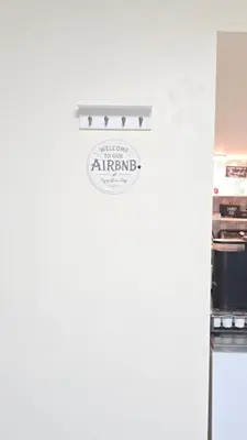 a sign on a refrigerator in a store at Staten Island Cozy Private 1-br Basement Apt close to NYC Family & Pet Friendly in Willowbrook