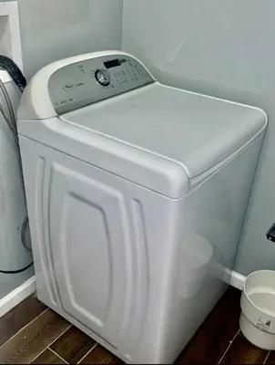 a white washer and dryer in a room at Cozy Rooms in a Modern and Beautiful Apartment in Irvington