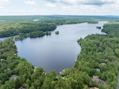 an aerial view of a large river with trees at Pocono Escape Style and Serenity in Pocono Pines