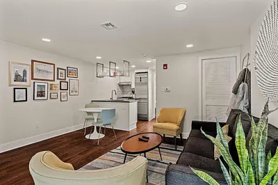 a living room with a couch and a table at Washington Square West - Unit A in Philadelphia