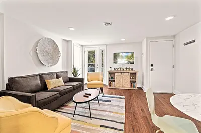 a living room with a couch and a table at Washington Square West Unit B in Philadelphia