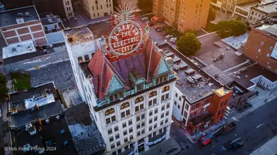 an overhead view of a building with a sign on it at NEW 