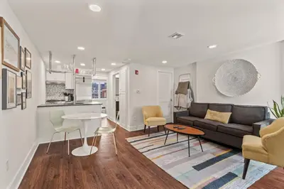 a living room with a couch and a table at Washington Square West in Philadelphia