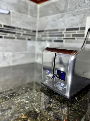 a toaster sitting on top of a counter at BP STAYS - Hotel-Style, No Host, Professionally Managed ID260 in Jersey City