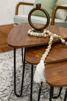 a wooden table with a rosary on top of it at Chic East Village Retreat Comfort in Heart of NYC in New York