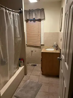 a bathroom with a shower and a sink at Near East Stroudsburg University in East Stroudsburg