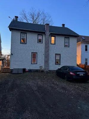 a house with a car parked in front of it at Near East Stroudsburg University in East Stroudsburg