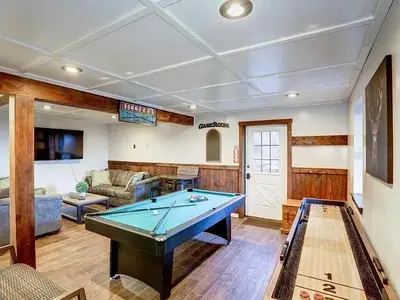 a living room with a pool table in it at Haven View Retreat in White Haven