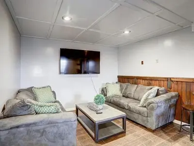 a living room with two couches and a table at Haven View Retreat in White Haven