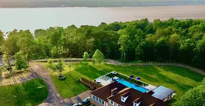 an aerial view of a house with a swimming pool at Carpathia West Estate in West Milford