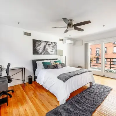 Modern 3BR Townhouse with Private Rooftop & Parking Minutes to NYC