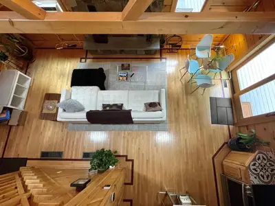 an overhead view of a living room with a white couch at Red Tail Ridge in North Branch