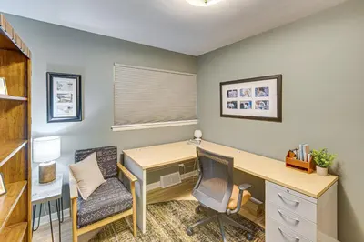 an office with a desk and two chairs at Near Dtwn Harrisburg Stylish Home with Patio and Yard in Camp Hill