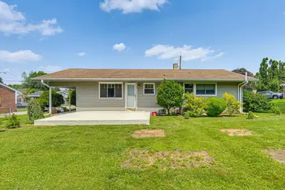 a house with a lawn in front of it at Near Dtwn Harrisburg Stylish Home with Patio and Yard in Camp Hill