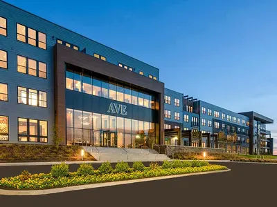 a large office building with a sign on it at AVE Blue Bell - Short Stay Furnished Apartment in Blue Bell