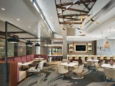 a rendering of a restaurant with tables and chairs at AVE King of Prussia - Short Stay Furnished Apartment in King of Prussia