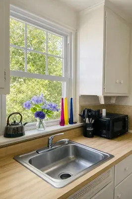 a kitchen counter with a sink and a microwave at 1BR Near Philly Free Parking, Monthly Discount in Philadelphia