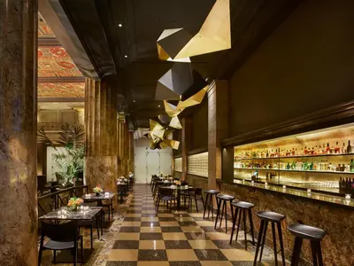 a restaurant with tables and chairs and a checkered floor at The Franklin Residences - Extended Stay Furnished Apartment, Philadelphia PA in Philadelphia