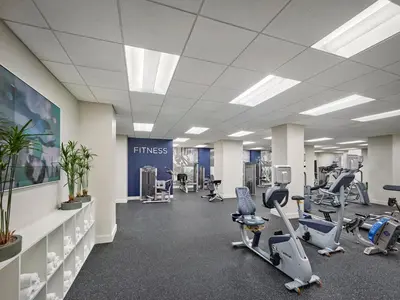 a fitness room with treadmills and cardio equipment at The Franklin Residences - Extended Stay Furnished Apartment, Philadelphia PA in Philadelphia