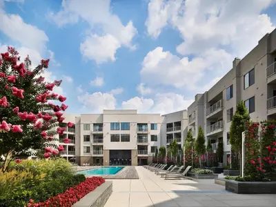 a courtyard of an apartment building with a pool at AVE Clifton - Furnished Apartment, Clifton NJ in Clifton