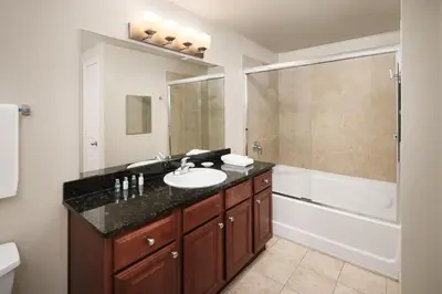 a bathroom with a sink and a tub and a shower at AVE Clifton - Furnished Apartment, Clifton NJ in Clifton