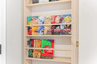 a book shelf withoku no my hero academia comics at The Respite getaway in Harrisburg