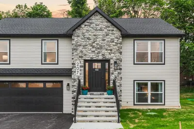 a rendering of a house with a garage at The Respite getaway in Harrisburg