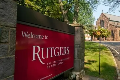 a sign that says welcome to ruchers in front of a church at Luxury 1BR Apt-Pool RWJ-Rutgers StPeter-Free Parking - NYC316 in New Brunswick