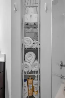 a towel rack in a bathroom with towels at Luxury 1BR Apt-Pool RWJ-Rutgers StPeter-Free Parking - NYC316 in New Brunswick