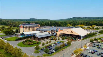 an aerial view of a town with a parking lot at The Lakefront Pocono Escape in Pocono Summit