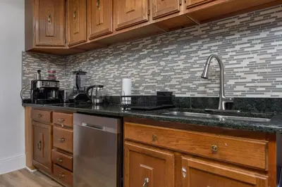 a kitchen with a sink and a counter top at Capitol View Retreat - 2F Fast Wi-Fi Spacious in Harrisburg