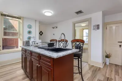 a kitchen with a sink and a counter top at Capitol View Retreat - 3F Fast Wi-Fi Cozy in Harrisburg