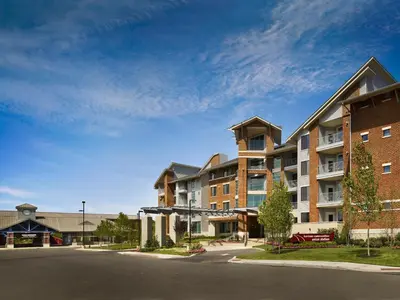 a large apartment building on the side of a street at AVE Union - Furnished Apartment, Union NJ in Union