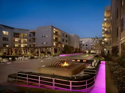 a fire pit in the middle of a courtyard at AVE Union - Furnished Apartment, Union NJ in Union