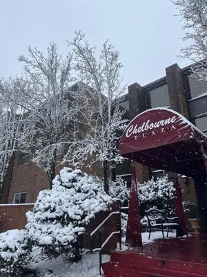 a restaurant covered in snow in front of a building at Bright & Spacious 2BR2BA Monthly Savings in Philadelphia