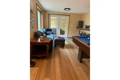 a living room with a pool table and a couch at Sweet Darlene with Hot Tub, Game Room and Pet Friendly in Albrightsville