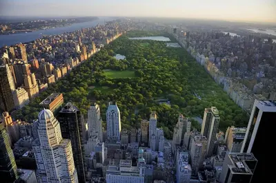 an aerial view of a city with tall buildings at 20 minutes to Central Park Manhattan New York City 16 mins Metlife stadium in West New York