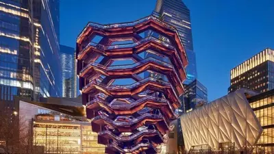 a tall building in a city with tall buildings at Al Demashqi in New York