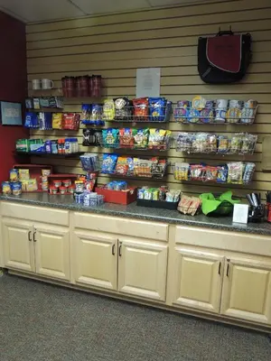 a store with a counter with food on it at Rutgers University Inn and Conference Center in New Brunswick