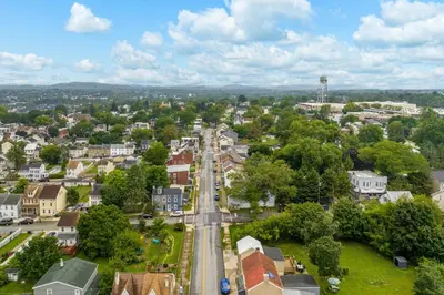 an aerial view of a town with a street at Cozy Full Home with Parking, 10min Walk to Bridge St in Phoenixville