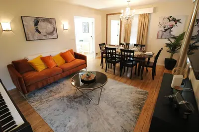 a living room with a couch and a dining room at Private Oasis Ranch • In Town Princeton • 2BR/2B in Princeton
