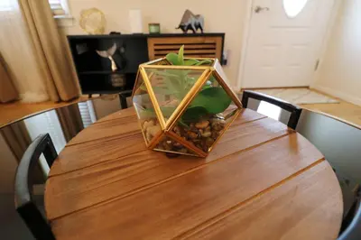 a glass container with rocks on a wooden table at Private Oasis Ranch • In Town Princeton • 2BR/2B in Princeton
