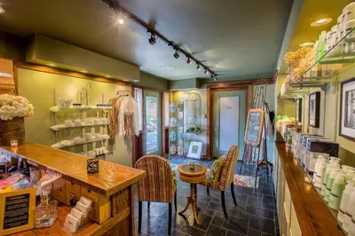 a room with chairs and a counter in a store at Stroudsmoor Country Inn in Stroudsburg